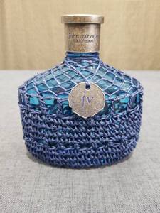 lot 1665 image: John Varvatos Artisan Fragrance Bottle with Netted Wrap