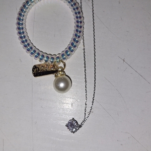 lot 45247 image: THEEVE JEWELRY NECKLACE AND BRACELET SET