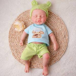 lot 2074 image: 12 Inch Full Body Silicone Reborn Baby Doll boy Eyes Closed  solid silicone,certified safe,not vinyl,lifelike,2.4lbs weighted,soft like real skin,Hand-painted,Gift box. Ages 3. - Retail $88.99