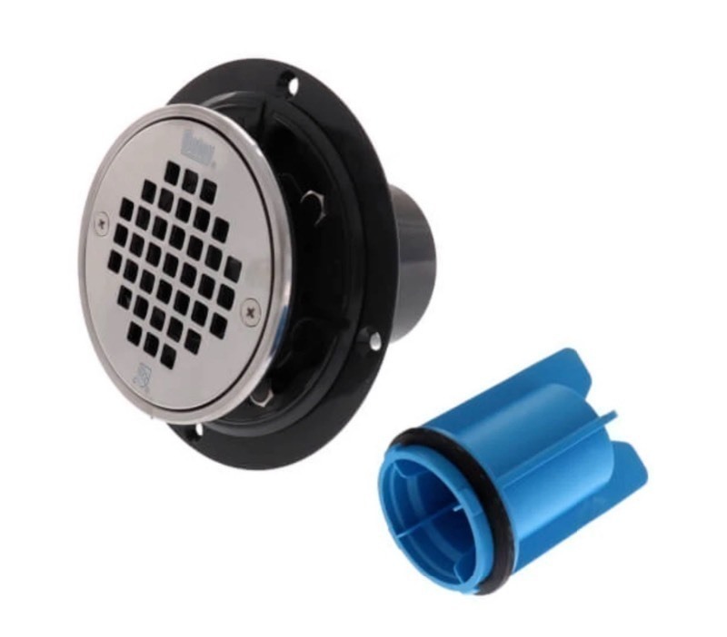 lot 648 image: New Oaty 2 or 3 PVC Shower Drain with Round Screw-In Stainless Steel Strainer, Tile Ring & Test Plug (4-Pack)