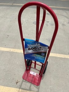 lot 25 image: Professional Quality Milwaukee Hand Truck - D Handle Red - Non-Flat Rubber Wheels