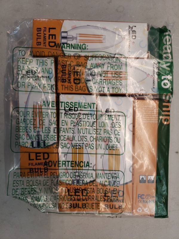 lot 27815 image: LED Filament Candle Bulb Multi-Pack E14 LED Bulb Dimmable 4W 2700K AC 110V-130V - Retail $20