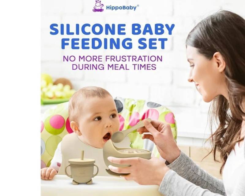 lot 27848 image: HippoBaby Baby Led Weaning Supplies  10 Piece Silicone Baby Feeding Set  Baby Toddler Bib Cup Divided Plate and Bowl Self Feeding Spoons Dish Set  Baby Utensils  Toddler Feeding Supplies (Cream) - Retail $30