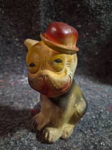 lot 74 image: Figurine with Red Bowler Hat, Dated April 2, 1936