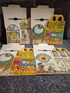 lot 83 image: Lot of 4 Vintage McDonalds Happy Meal Boxes