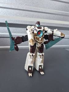 lot 121 image: Transformers Action Figure Robot with Accessories White Brown Teal - Incomplete
