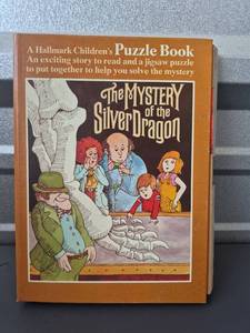 lot 130 image: Hallmark Childrens Puzzle Book The Mystery of the Silver Dragon 7x10.5 Over 110pc