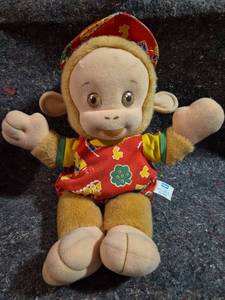 lot 146 image: Playskool Monkey Loves Plush Doll with Holiday Outfit