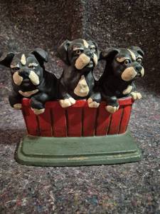 lot 172 image: Cast Iron Three Dog Figurines in Red Basket DR.89