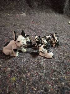 lot 175 image: Black and White Dog Figurines with Chain Leash Set of 8