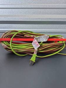lot 225 image: Extension Cord with Lime Green and Red Jacket