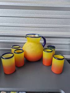 lot 229 image: 7-Piece Glassware Set Yellow Orange Red Ombre Blue Rim Pitcher Tumblers