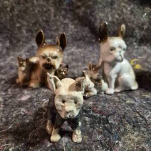lot 242 image: Three Little Dog Figures