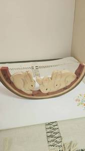 lot 227 image: Wooden Rocking Toy with Three Rabbit Figures&nbsp