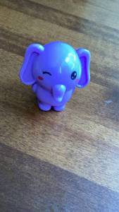lot 238 image: Purple Elephant lip balm Figure -&nbsp