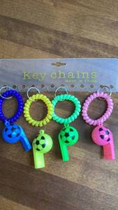lot 348 image: Key chains 4-Pack Coiled Cord Soccer Ball Whistle Assorted Colors -&nbsp