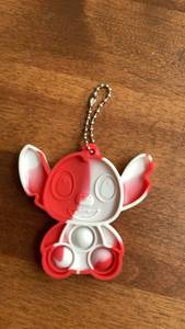 lot 349 image: Pop It Fidget Toy stitch Keychain Red White -