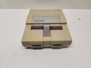 lot 21 image: Nintendo Super NES Console with Two Controllers