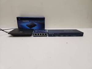 lot 44 image: Linksys SE1500 5-Port Fast Ethernet Switch with NETGEAR Devices