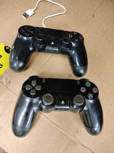 lot 61174 image: two Sony PlayStation 4 DualShock 4 Wireless Controllers