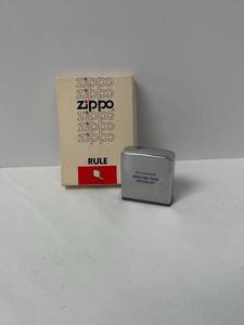 lot 61115 image: vintage Zippo Rule No. 6260 pocket tape measure
