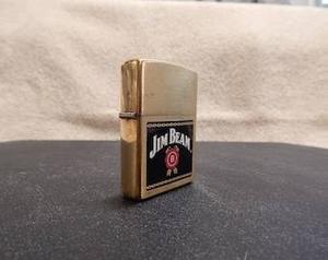 lot 61134 image: brass-finish Jim Beam emblem Zippo