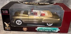 lot 61136 image: 118 scale die-cast metal replica of a 1949 Cadillac Coupe de Ville by Road Signature