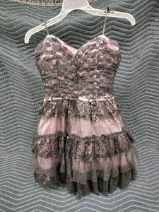 lot 1085 image: pink and black lace-trimmed tiered sequin homecoming cocktail dress by Masquerade