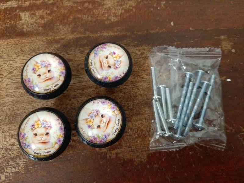 lot 16739 image: 4 Pack Bunny with Happy Easter Ribbon Cabinet Knobs Round Drawer Pulls Black Dresser Knob Cupboard Door Handles Hardware for Kitchen Bathroom Cabinets - Retail $15