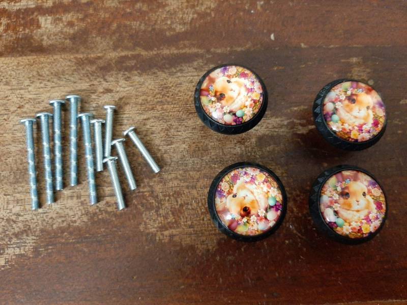 lot 16740 image: 4 Pack Bunny with Happy Easter Ribbon Cabinet Knobs Round Drawer Pulls Black Dresser Knob Cupboard Door Handles Hardware for Kitchen Bathroom Cabinets - Retail $15