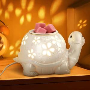 lot 46875 image: Electric Wax Melt Warmer, Turtle Ceramic Wax Warmer Burner for Scented Cubes, Candle Wax Melter with 2 Light Bulbs Fragrance Oil Warmer for Home Bedroom Aromatherapy Gifts - Retail $27