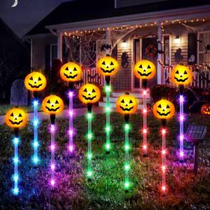 lot 46904 image: 10 Pcs Halloween Solar Pumpkin Pathway Lights Decorations Outdoor, Jack O Lantern Pumpkins Decor with 5 Colors of Light-up Path Maker Stakes for Graveyard Porch Yard Lawn Garden Party Supplies - Retail $25