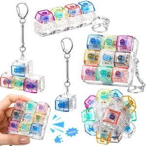 lot 46926 image: 5 Pcs Keyboard Fidget Clicker Keychains in 5 Styles, Back to School Gift Fidget Mechanical Button Clicker Stress Relief Gift for First Day of School Office Home(Color Transparent) - Retail $20