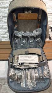 lot 58 image: Picnic Backpack Set with Service for 4 (Flatware Glasses and Plates). Appears in brand new condition.