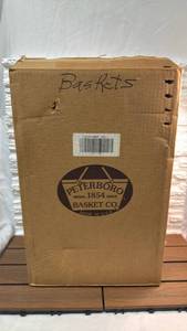 lot 64 image: Brand new Peterboro Basket Co. Maroon Woven Basket -Lot of 2. Still in original box