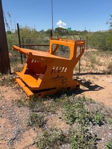 lot 761 image: LandHonor Pallet Forks Skid Steer bucket auger carry all