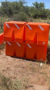 lot 1051 image: Orange Traffic Barrier Blocks with Reflective Strips 4 Units