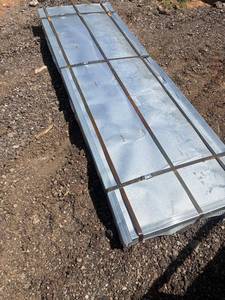 lot 699 image: 10ft  long Galvanized Metal Roofing Panels Bundle Strapped Lot 100 pcs