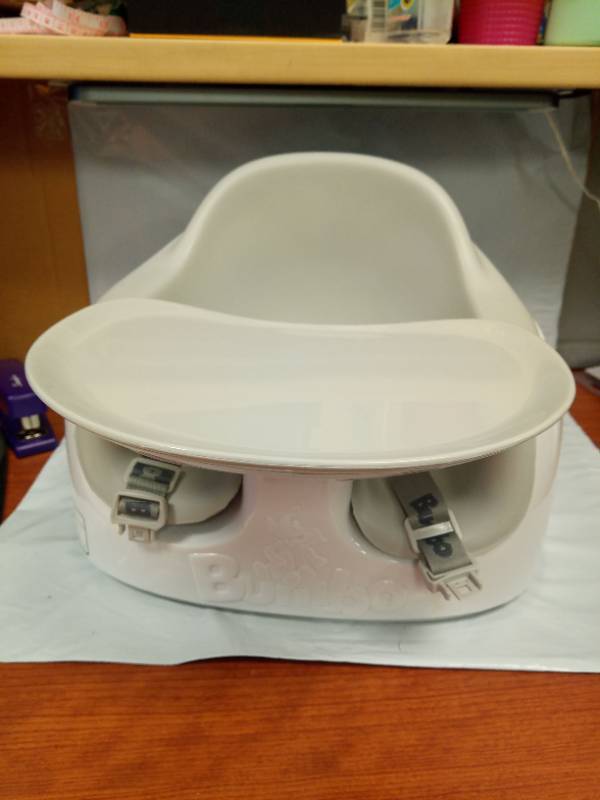 lot 1091 image: Bumbo Booster Seat with Tray and Buckles GreyWhite - Retail $60