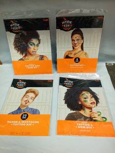 lot 1063 image: Hyde and Eeki Boutique Tattoo Kit Lot 4-Pack Mermaid Cheetah Snake Beard - Retail $0