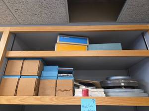 lot 23084 image: Film Loop, Radio Shack TRS-80, Courier 2400 Modem and More