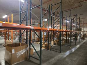 Pallet Racking System w/ Orange Beams Green Uprights