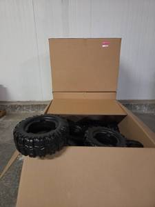 lot 21118 image: Black Plastic Tires&nbspModel BE4463 2 12 cases