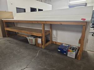 lot 21197 image: Wooden Work Bench with White Laminate Top and Storage Shelf