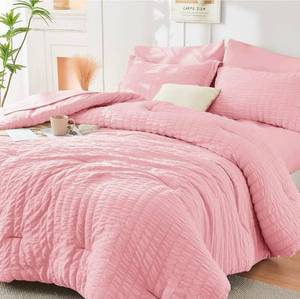 lot 515 image: King Size HYMOKEGE Pink Queen Comforter Set Seersucker 7 Pieces, All Season Luxury Bed in a Bag for Bedroom, Bedding Set with Comforters, Sheets, Pillowcases & Shams - Retail $0