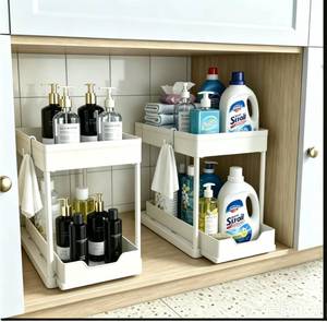 lot 58978 image: Cabinet, 2 Pack Under Sink Organizer, 2 Tier Sliding Bathroom Kitchen Organizer, Large White ABS Baskets, Easy Install & Clean - Retail $30