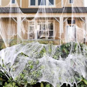 lot 64229 image: 1000 sqft Spider Webs Halloween Decorations Bonus with 30 Fake Spiders, Super Stretch Cobwebs for Halloween Indoor and Outdoor Party Supplies - Retail $7