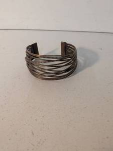 lot 25 image: Multi-strand cuff bracelet with flat bar ends