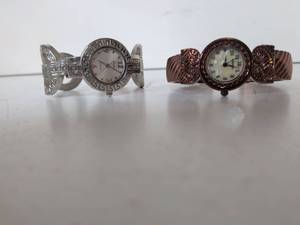 lot 30 image: Geneva Platinum Cuff Bracelet Watches Lot of 2