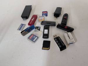 lot 51 image: Lot of 13 USB Flash Drives SD Cards Memory Card Readers and Adapters